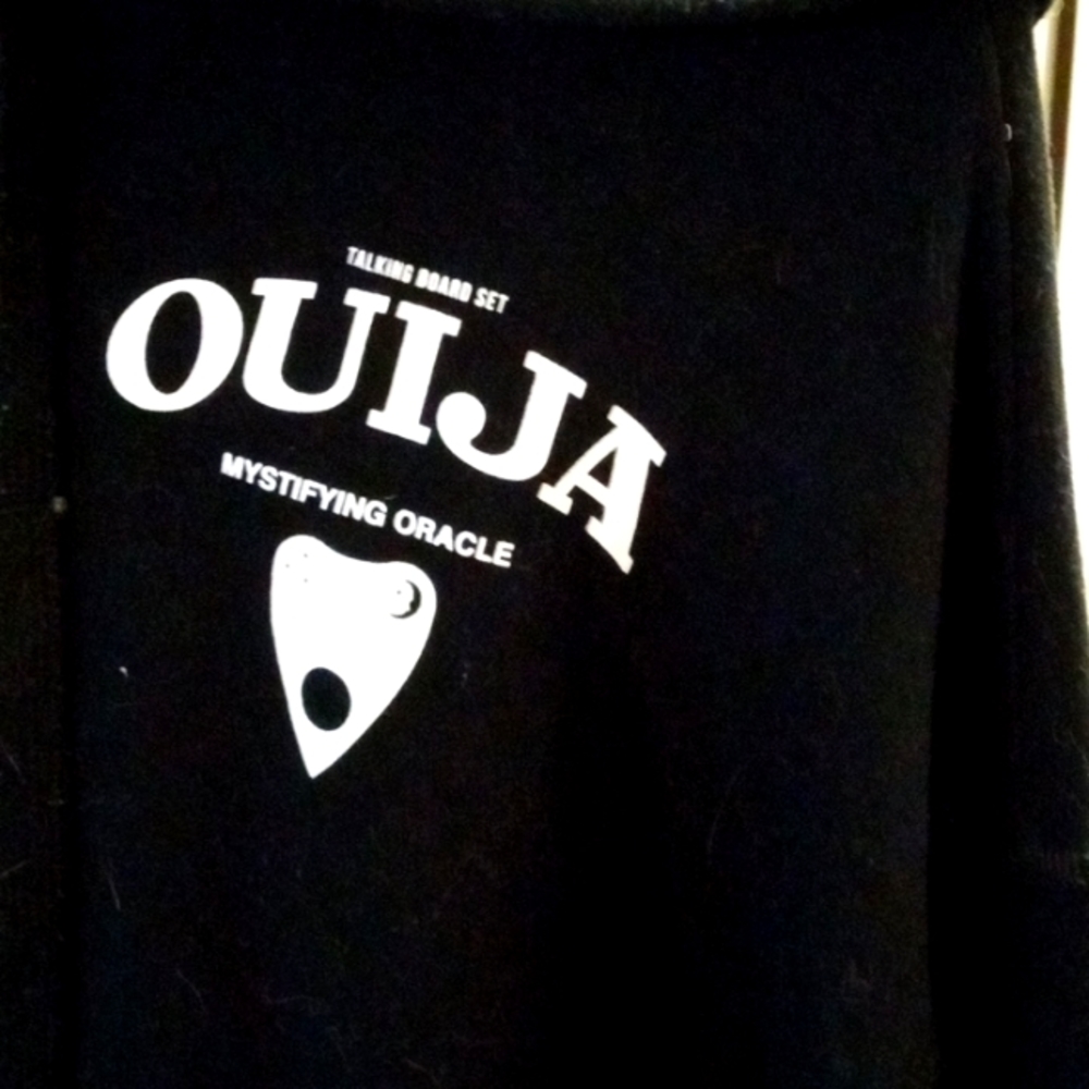 A black crop top hoodie